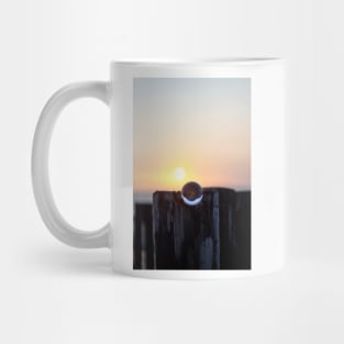 Glass ball at sunset Mug